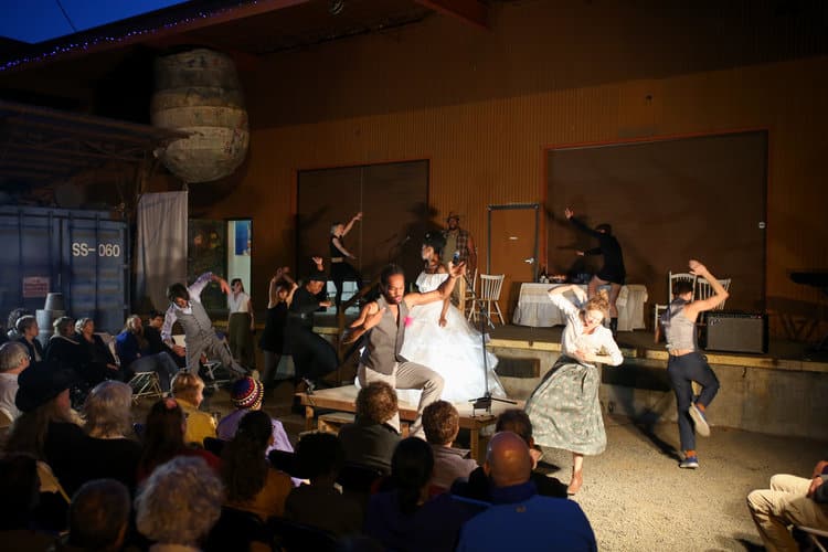 A production photo from BLOOD WEDDING, where actors are dancing.